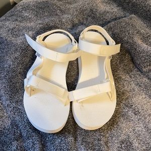 White Teva mid-form sandals
